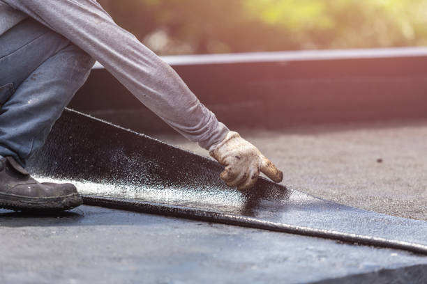 Professional Basement Waterproofing technician working in Mendon, MI